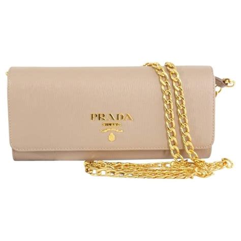 prada puch|Prada clutch bag.